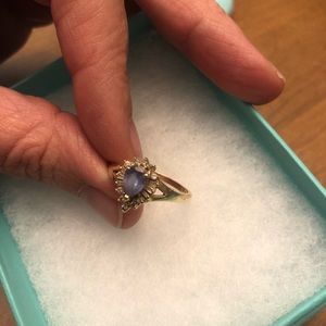 Tanzanite and beget diamond ring.